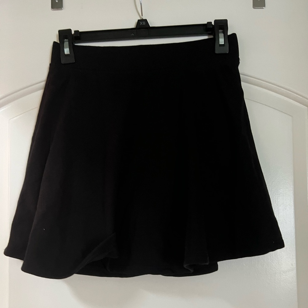 Girls  black skirts size 14